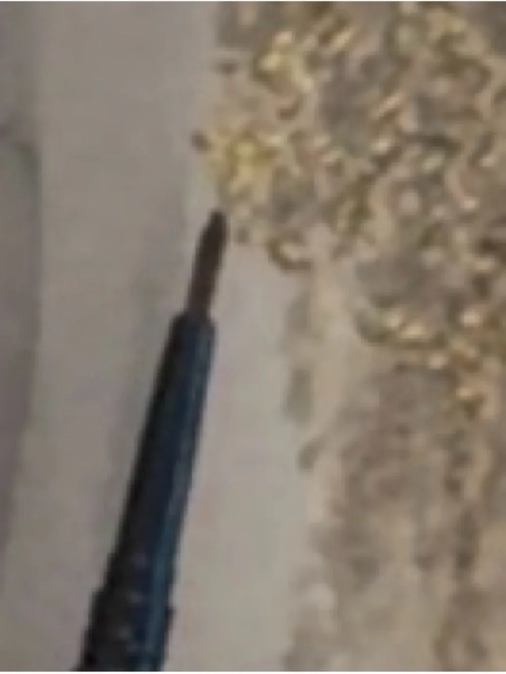 Brown eyeliner or eyebrow pencil